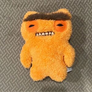 Orange Stuffed Monster Toy